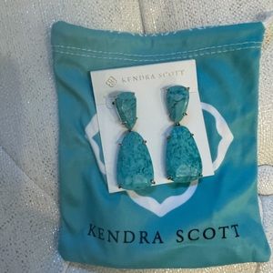 Kendra Scott turquoise earrings.